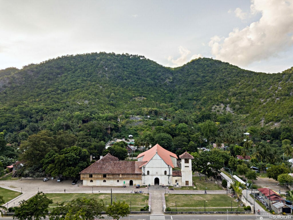 Boljoon Church with Cebu's mountain range in the background.