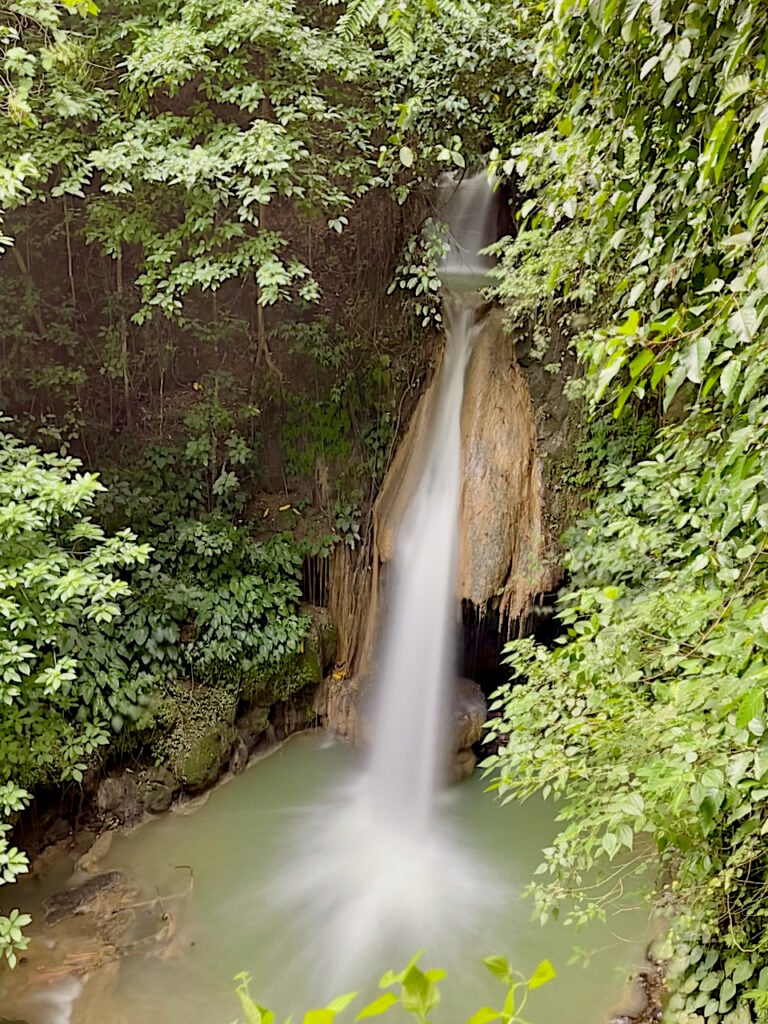 Mangitngit Waterfalls features several levels of water flowing from the valley through to Middle Earth Mountain Resort in Carmen.