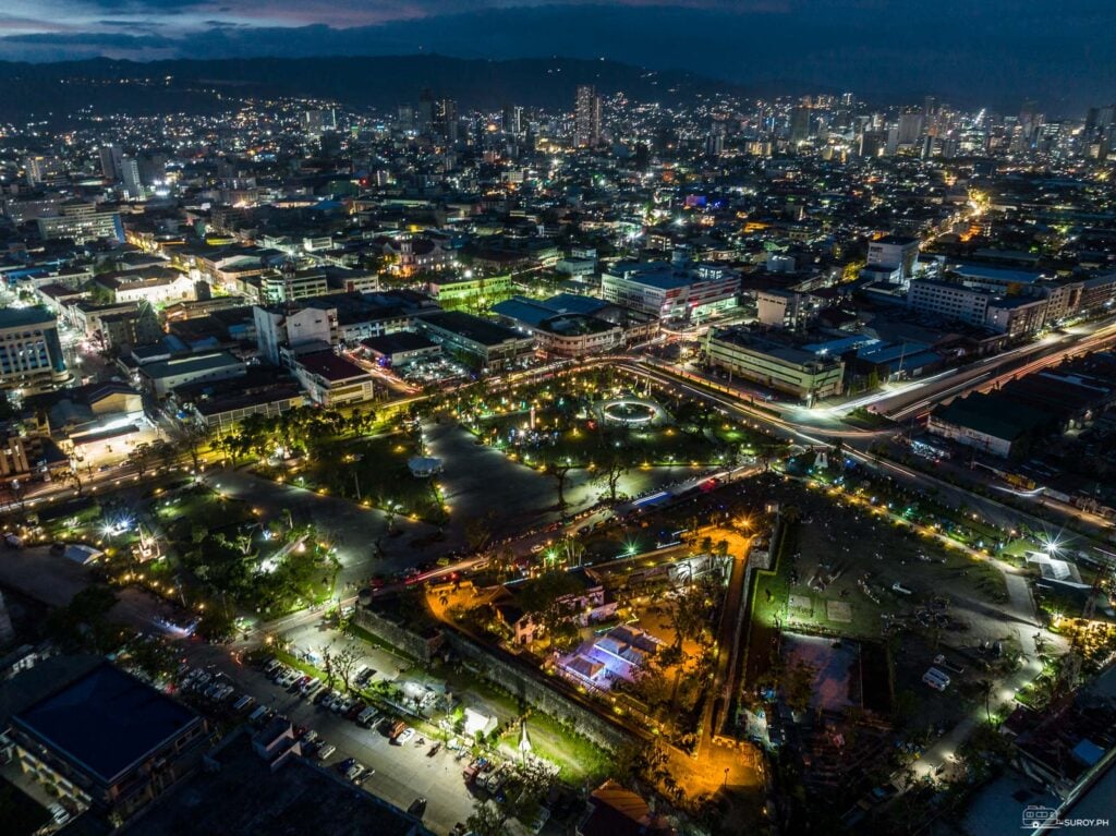 Fort San Pedro and Cebu City at night.