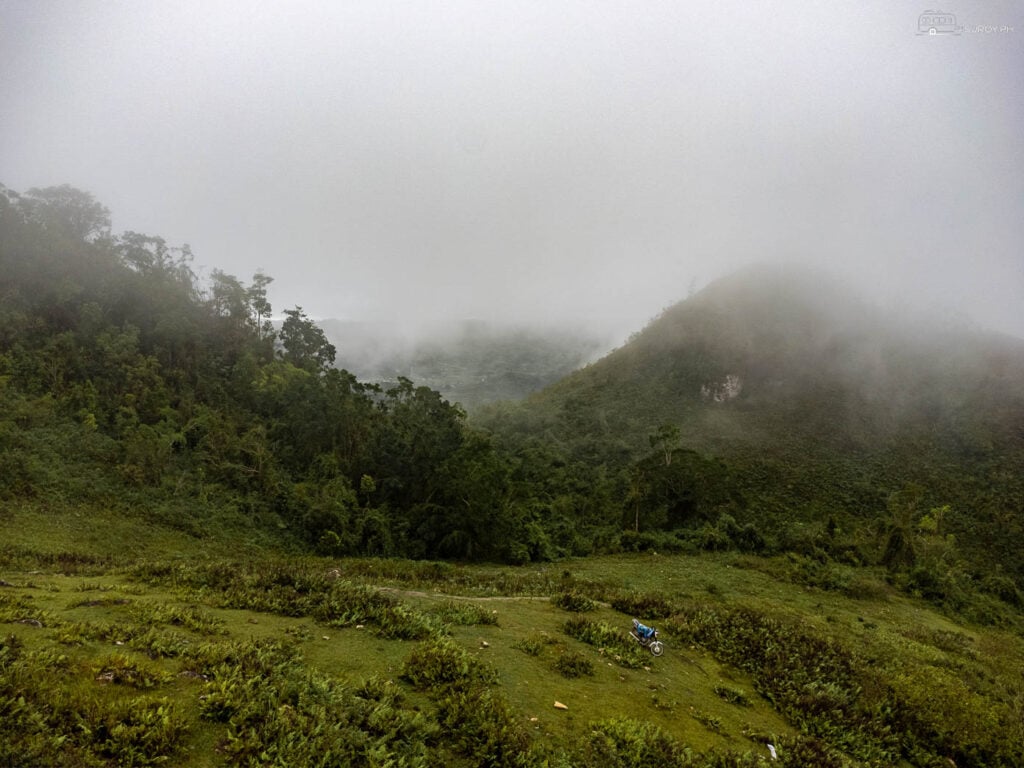 A foggy dramatic shot of the mountains.