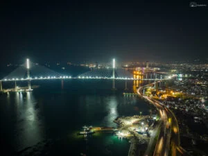 The iconic CCLEX at night with the cross lighted up.