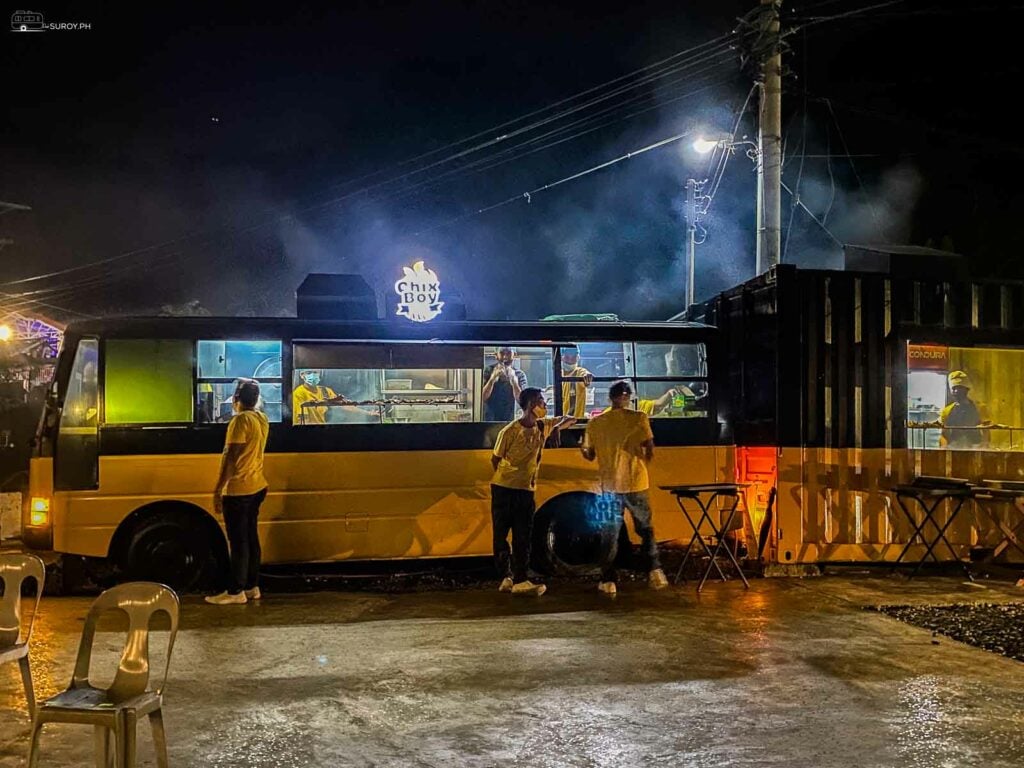 The signature Chixboy container bus serves as their kitchen.