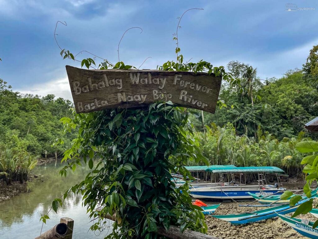 A playful sign at Bojo River captures the spirit of the local community.