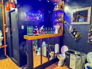 A unique and quirky bar setup at Bathroom Bistro in Naga, featuring bathroom-themed decor.