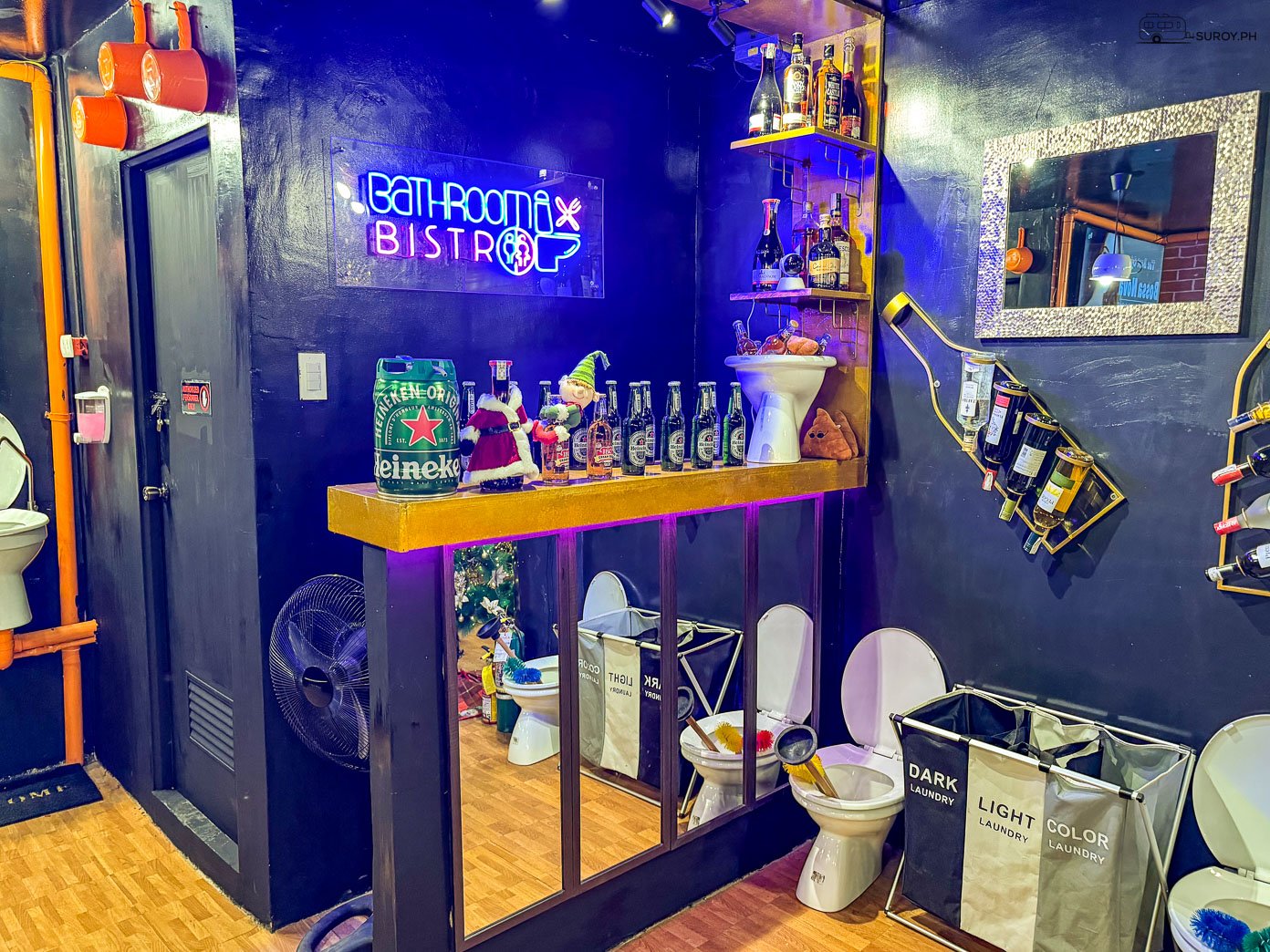 A unique and quirky bar setup at Bathroom Bistro in Naga, featuring bathroom-themed decor.