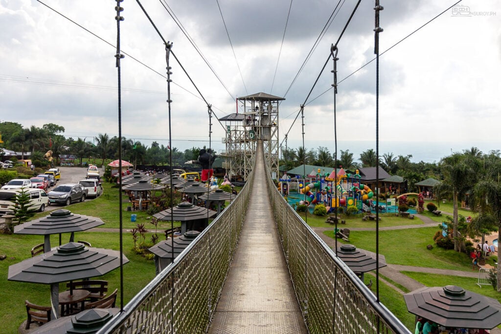 Hanging Bridge: Dare to cross the hanging bridge and take in the panoramic vistas of Campuestohan Highland Resort, a journey that promises both thrill and beauty.