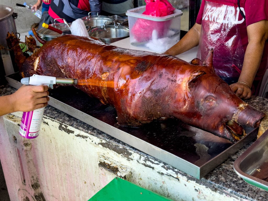 Preparing the lechon in Carcar Public Market.
