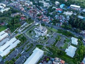 An aerial view of The Church of Jesus Christ of Latter-day Saints in Lahug, Cebu, showcasing its impressive architecture and surrounding greenery.