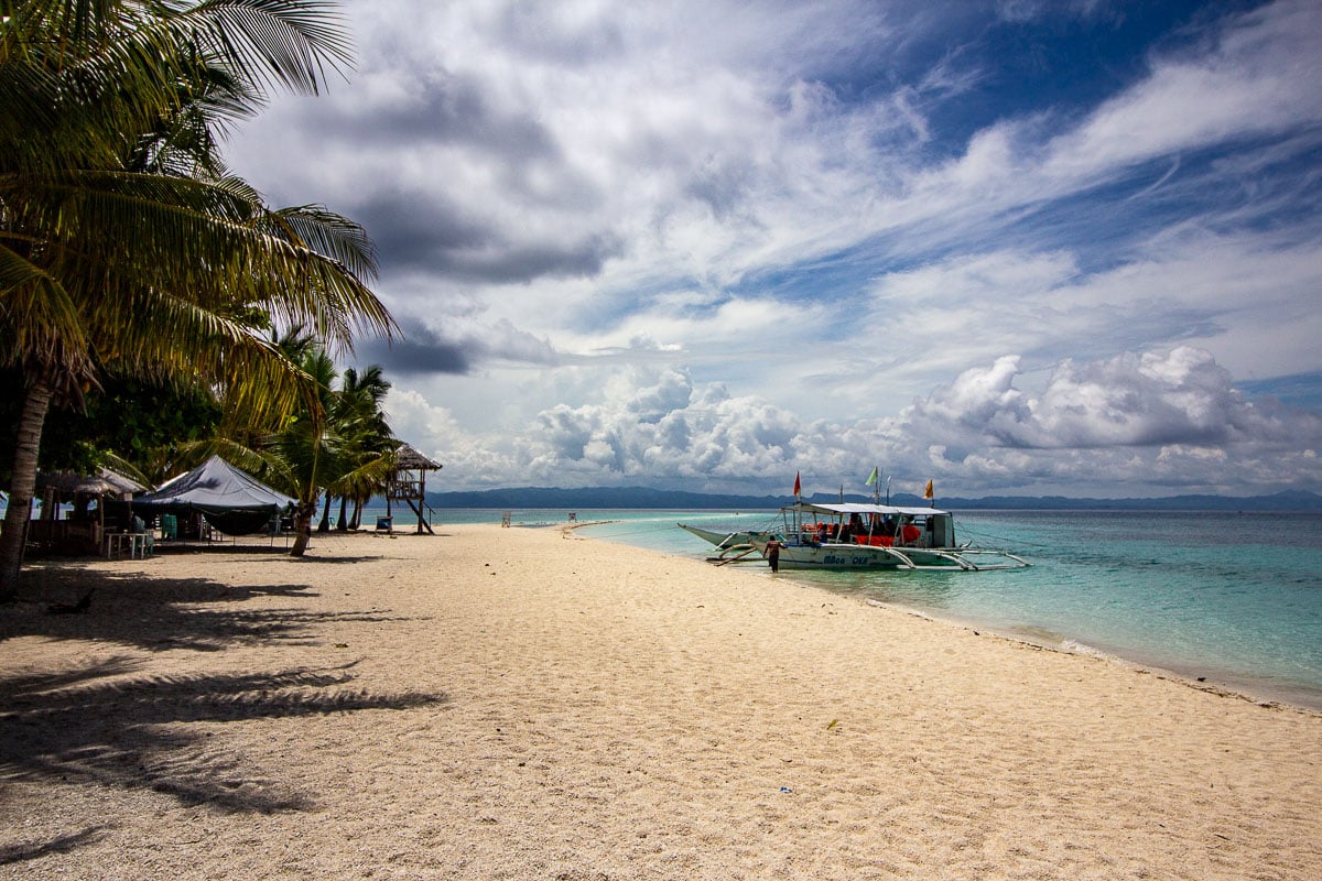 Pristine sands and turquoise waters await at the breathtaking Kalangaman Island in Leyte.