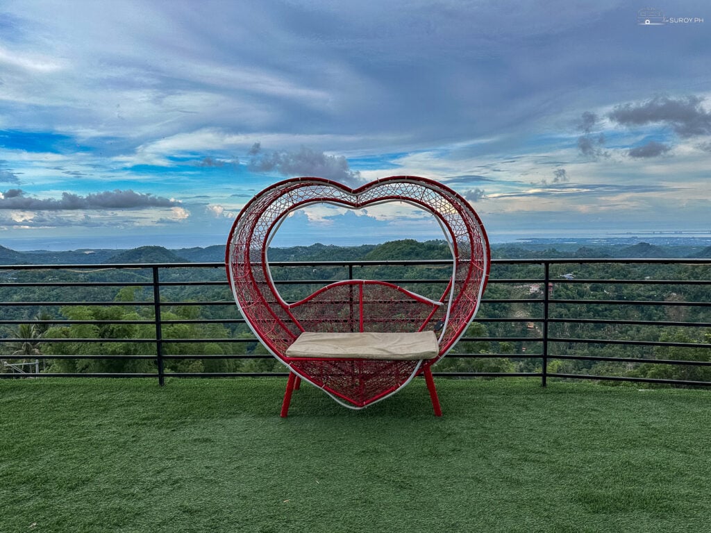 Capture beautiful moments with breathtaking views from this heart-shaped love seat.