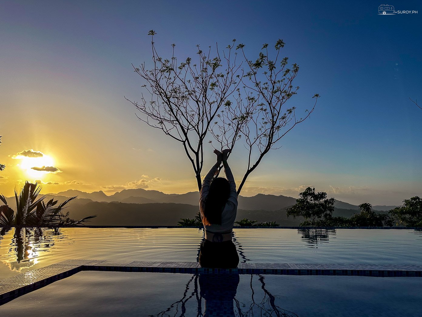 End your day with a swim in the infinity pool, as the sun sets over the horizon at Mabini Sky View Resort in Cebu.