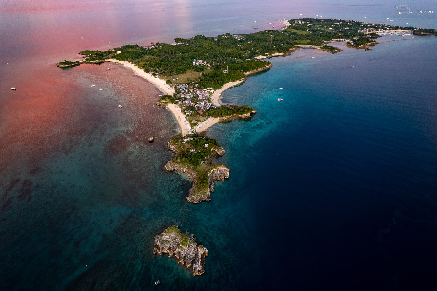 Experience the breathtaking sunset over Malapascua Island in Cebu, painting the sky with vibrant hues.