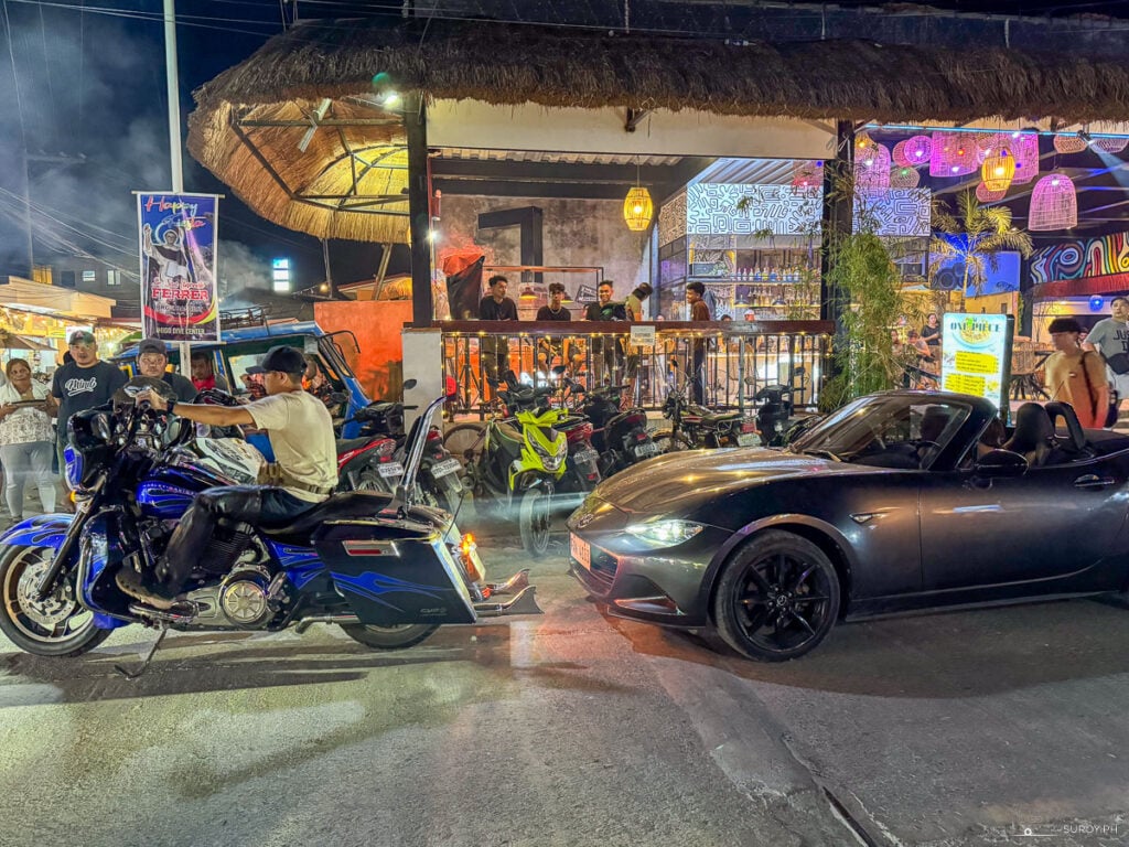 The busy street of Basdiot, Moalboal, is where visitors can have a wide selection of food and drinks at night.