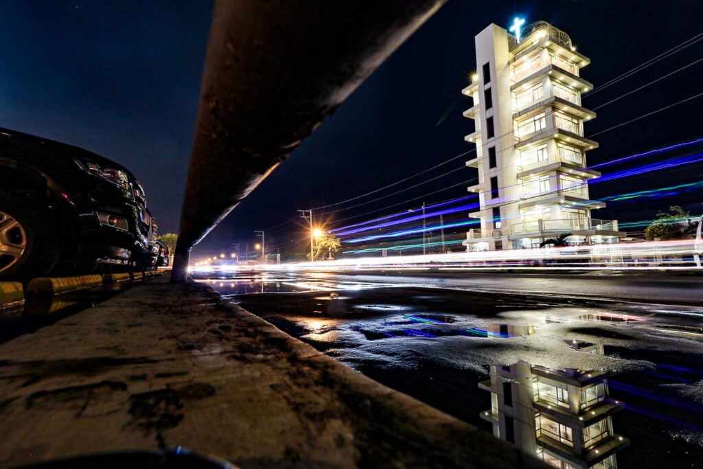 Pope John Paul II Tower at night.