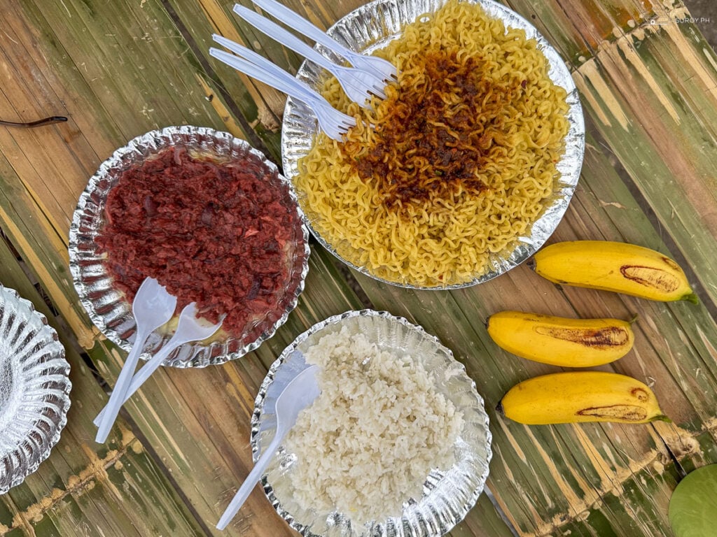 Having breakfast after a long hike at Starbuk's Kapehan.