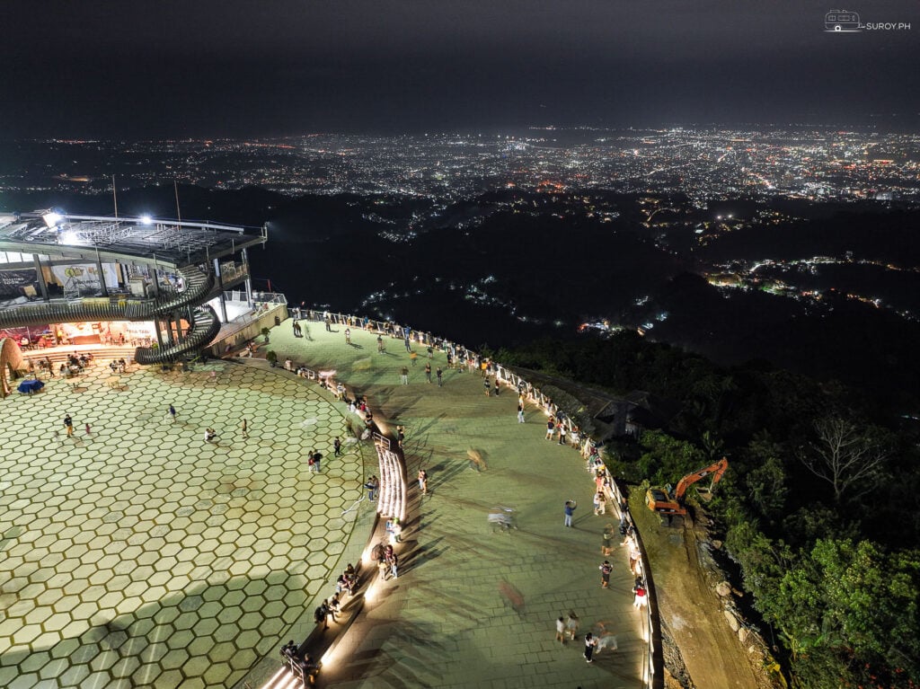 Spectacular Night View - The newly renovated Tops Lookout comes alive at night, offering a mesmerizing view of Cebu City’s twinkling lights.