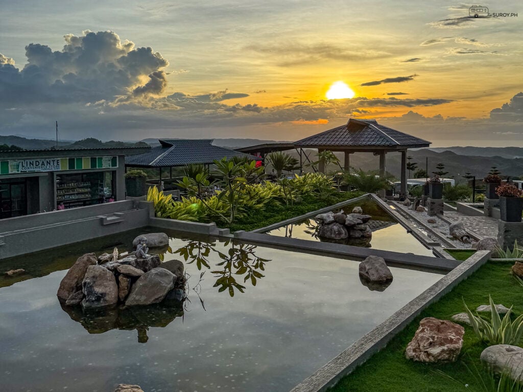 Sunset Magic - Witness the magic of the sunset from the picturesque view deck at Tuburan 360—a moment of pure tranquility and beauty.