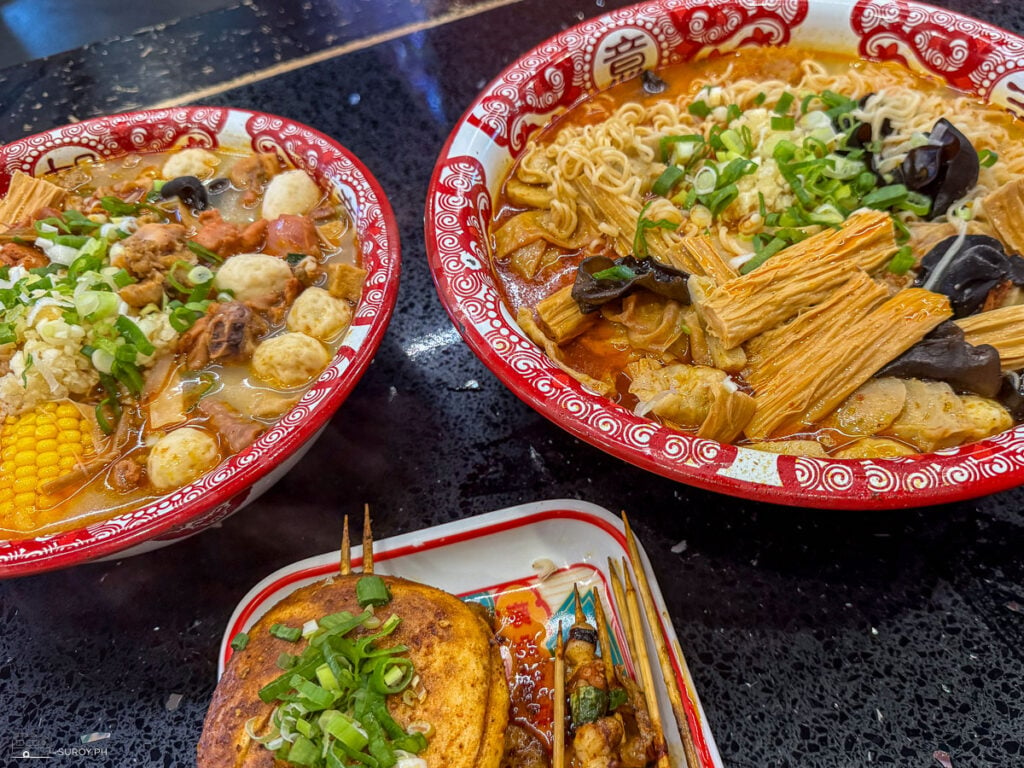 A delightful spread of malatang bowls at Yang Hero in Cebu, each brimming with fresh ingredients and rich, flavorful broth.