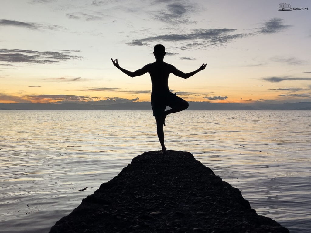 Tree Pose at Sunset: Unleash your inner yogi. Embrace Balance and Serenity by the Sea
