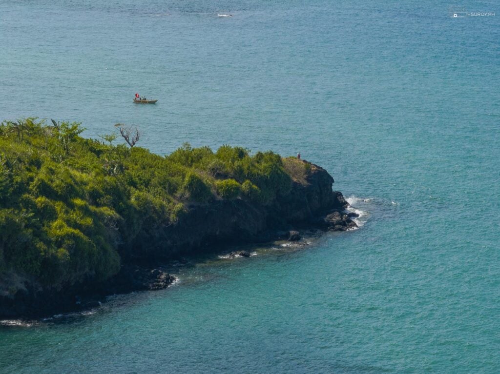 The coastline view from the ruins, where history meets the serene sea.