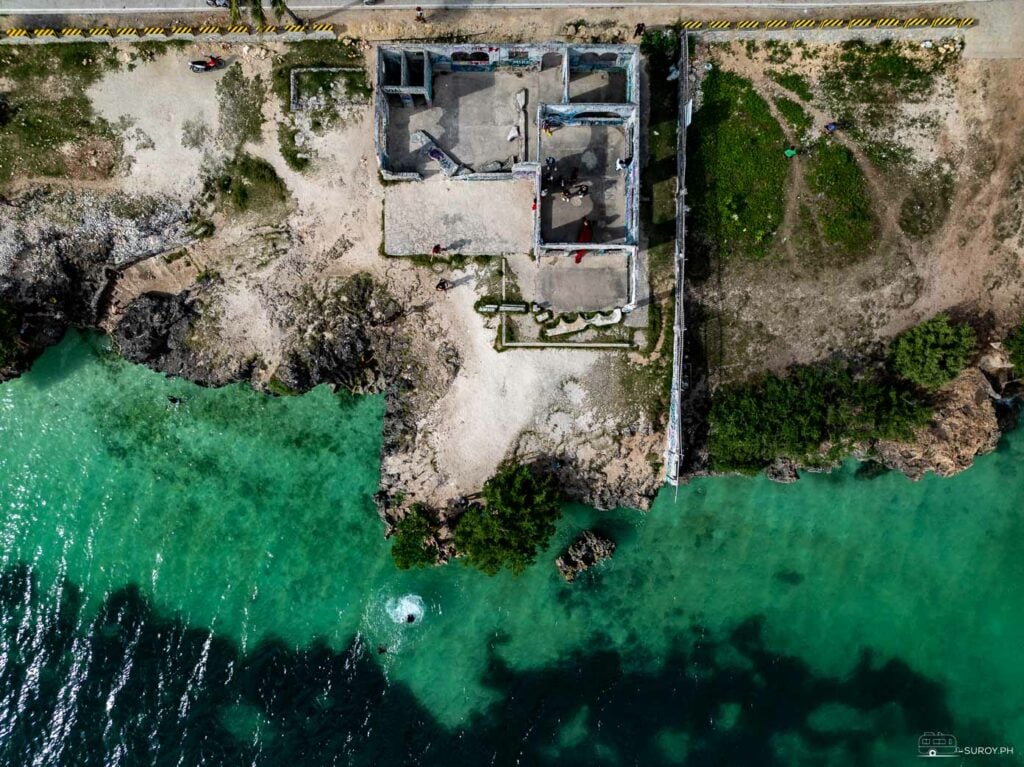 An aerial view of the picturesque Ruins of Bantayan. This is the spot where you can do cliff-jumping.