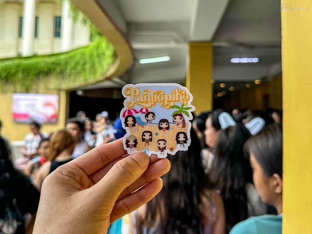 Fans proudly show off their Bini-themed stickers as they await the concert’s start at Waterfront Cebu!