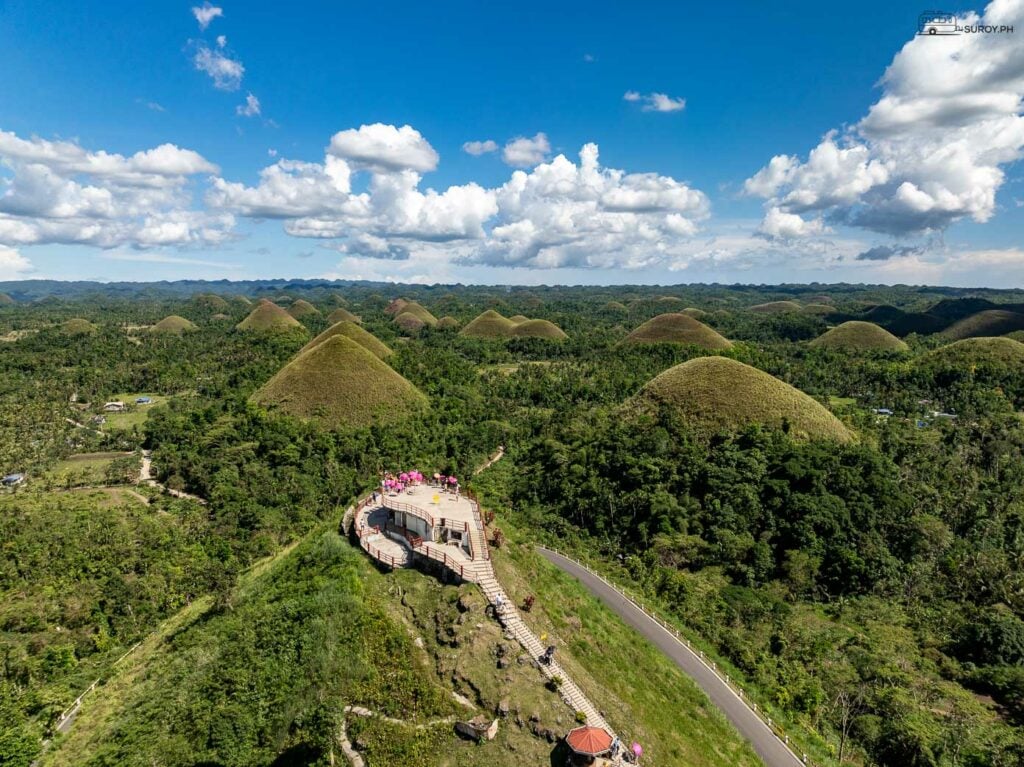 The iconic Chocolate Hills, with the viewing deck offering breathtaking views.