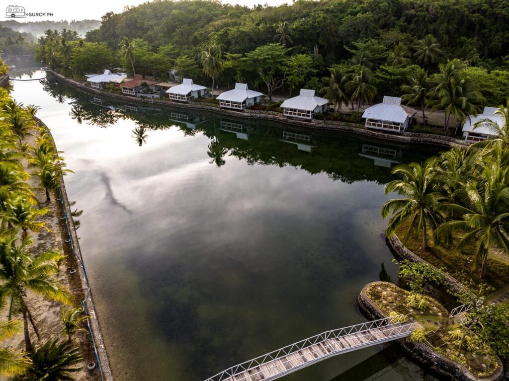 The charming villas along the lagoon at Golden Sands Destination Resort offer a peaceful retreat amidst nature.