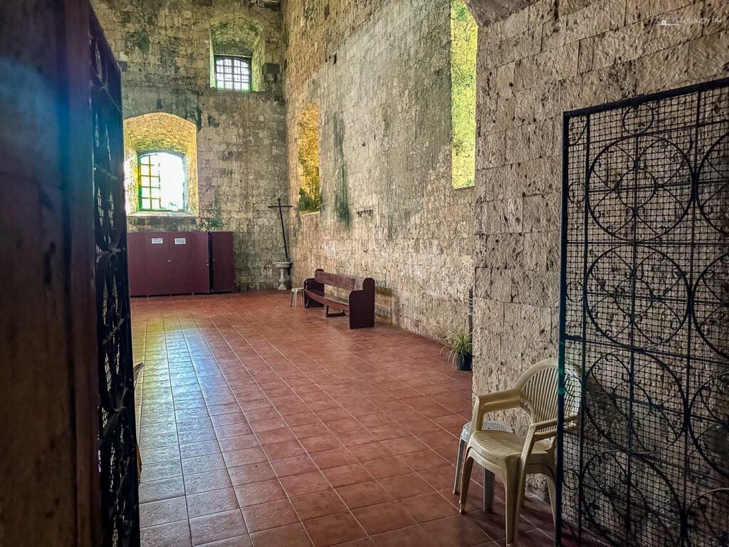 A tranquil corner in the church with its ancient coral stones sourced from the sea.