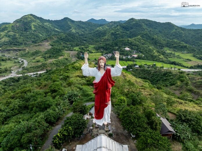 Standing tall amidst the lush landscapes, this 132-foot statue of the Sacred Heart of Jesus in Roxas City, Capiz, is a beacon of faith and a marvel of devotion.