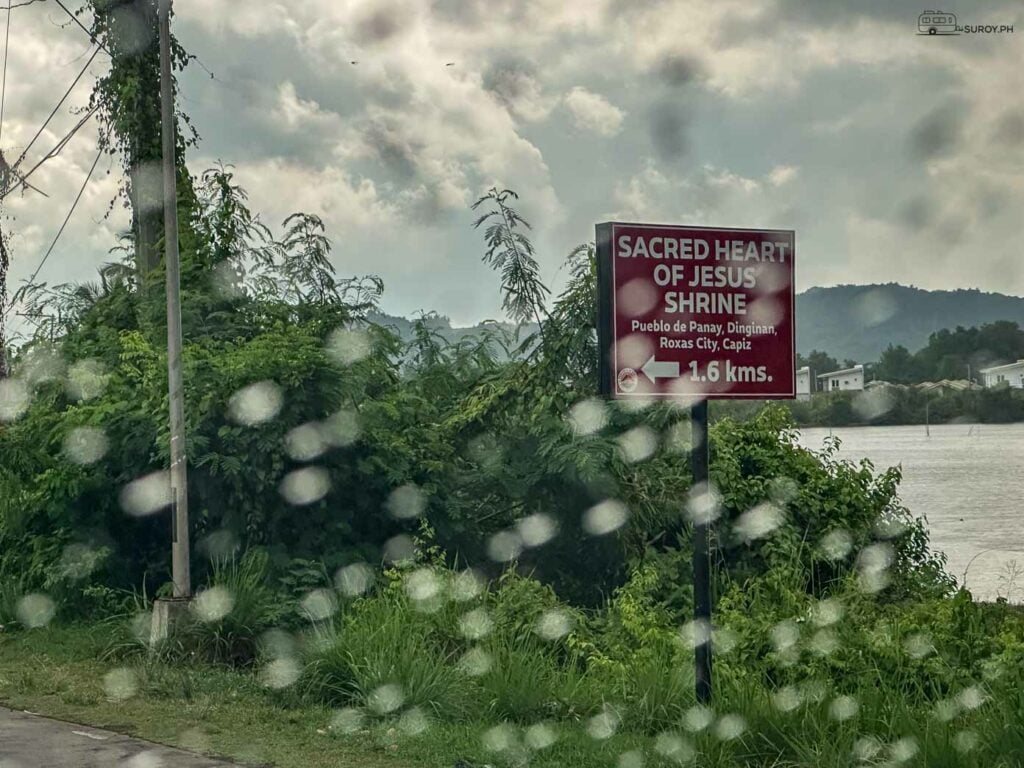 Guiding the Way: A signpost guiding visitors to the Sacred Heart of Jesus Shrine, a must-visit landmark in Roxas City for both spiritual seekers and tourists.