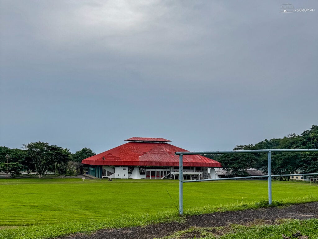 VSU Gymnasium: A wide shot of the VSU gymnasium, a hub for sports and university events, set against the lush green field of the campus.