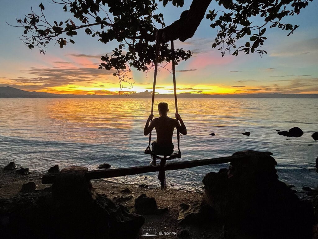 Swinging into the sunset, leaving behind the stress of everyday life. As the colors of the sky blend into calmness, find your mental escape in the simplicity of nature’s beauty.