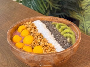 A tropical paradise in a bowl! This yogurt bowl is topped with fresh mango, kiwi, granola, and chia seeds—healthy and Instagram-worthy.