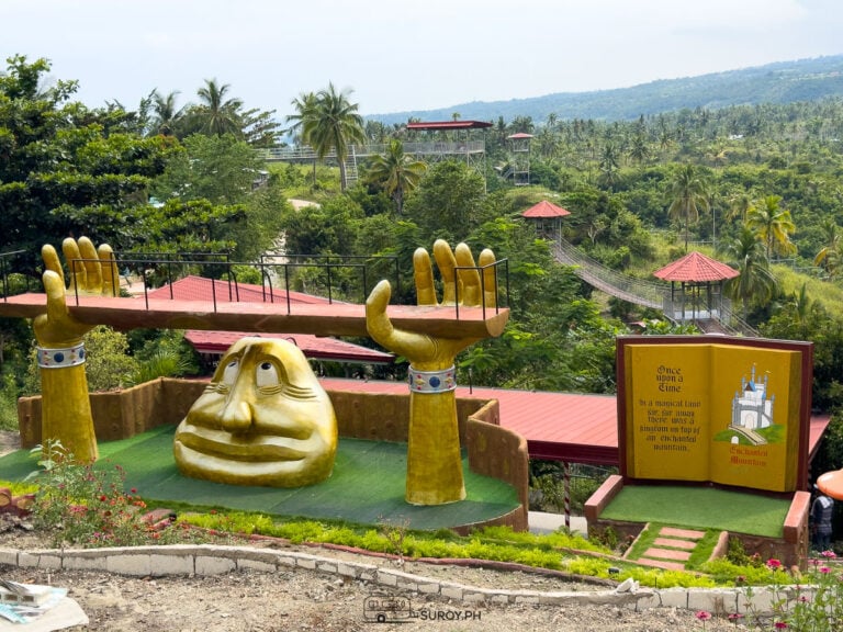 “Once Upon a Time…” comes alive with this massive storybook sculpture, inviting visitors to step into the enchanted narrative of the mountain in Dalaguete.