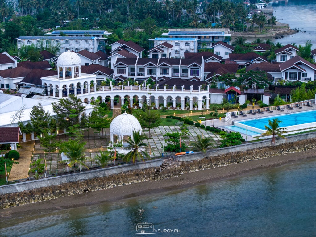 A view of the expansive grounds and infinity pool at Maayo Argao Resort, blending luxury with natural beauty.