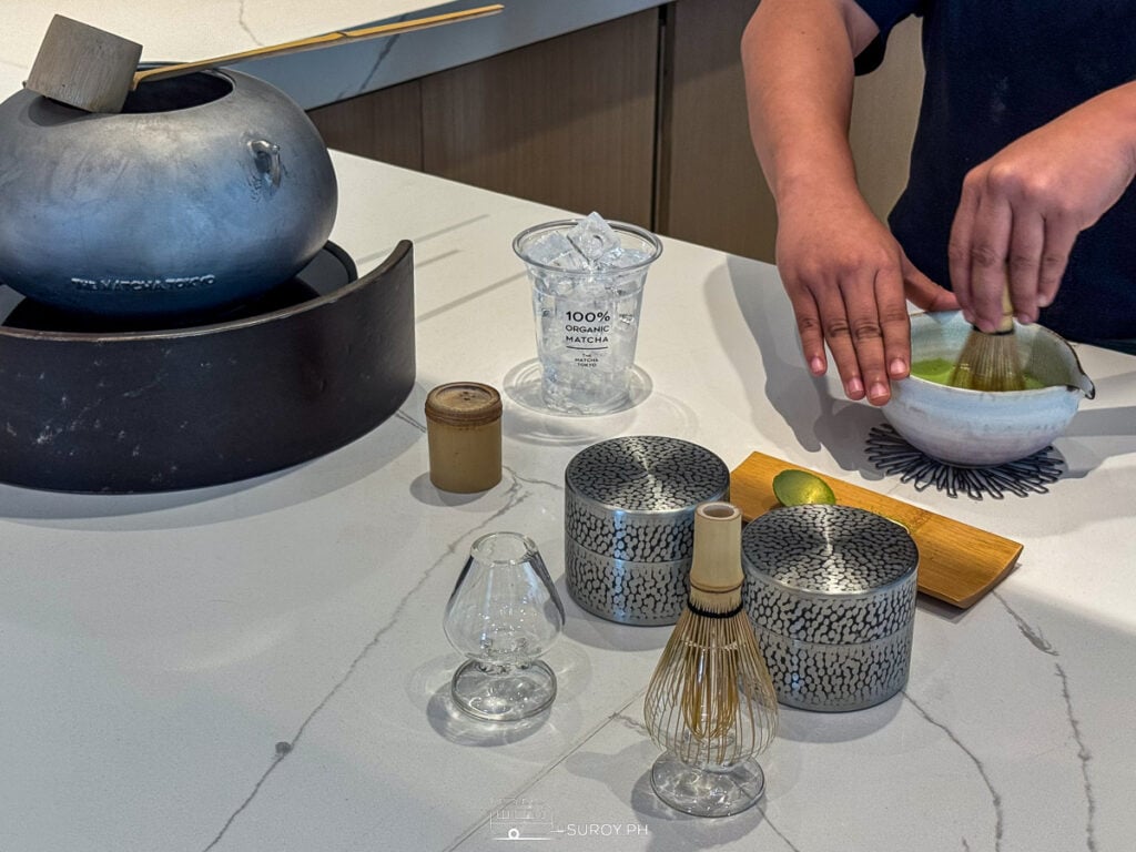 Witness the traditional art of matcha preparation at The Matcha Tokyo, where every cup tells a story.