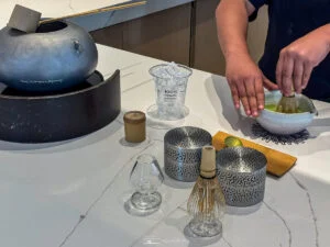 Witness the traditional art of matcha preparation at The Matcha Tokyo, where every cup tells a story.