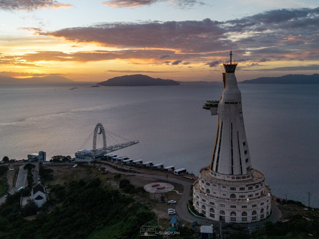 A divine sunrise at Montemaria Shrine, where the towering statue of the Virgin Mary watches over Batangas Bay—truly a breathtaking start to a spiritual journey.