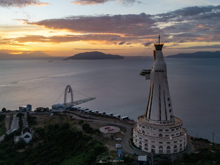 A divine sunrise at Montemaria Shrine, where the towering statue of the Virgin Mary watches over Batangas Bay—truly a breathtaking start to a spiritual journey.