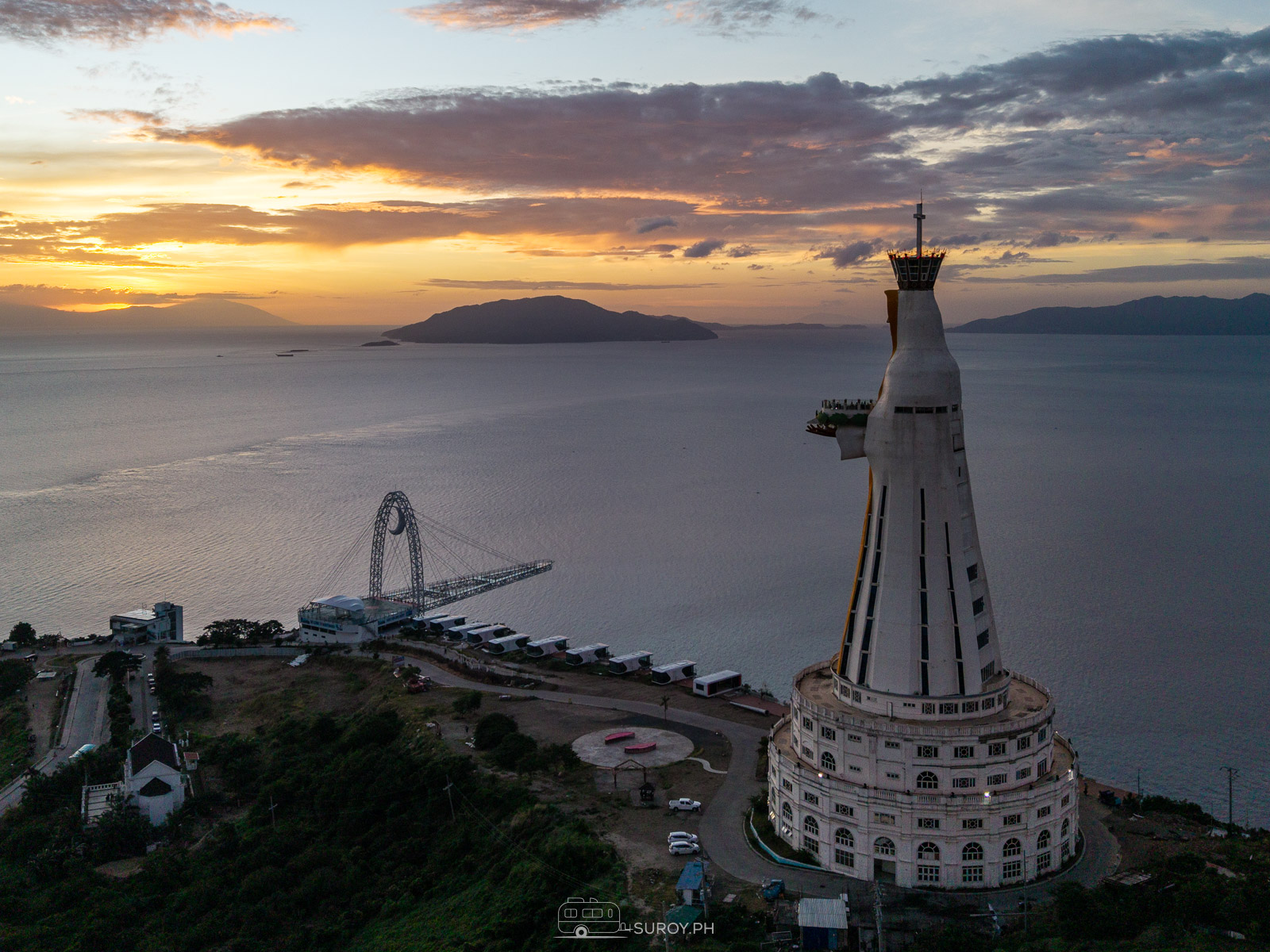 A divine sunrise at Montemaria Shrine, where the towering statue of the Virgin Mary watches over Batangas Bay—truly a breathtaking start to a spiritual journey.
