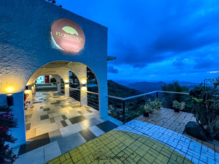 The entrance to Florentino’s in Busay welcomes guests with its elegant Mediterranean-inspired design and breathtaking mountain views, setting the stage for a unique dining and art experience.