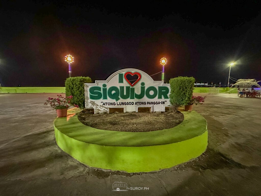 At night, the island glows in neon and nostalgia. The I Love Siquijor sign isn’t just for photos but a promise that you’ll come back.
