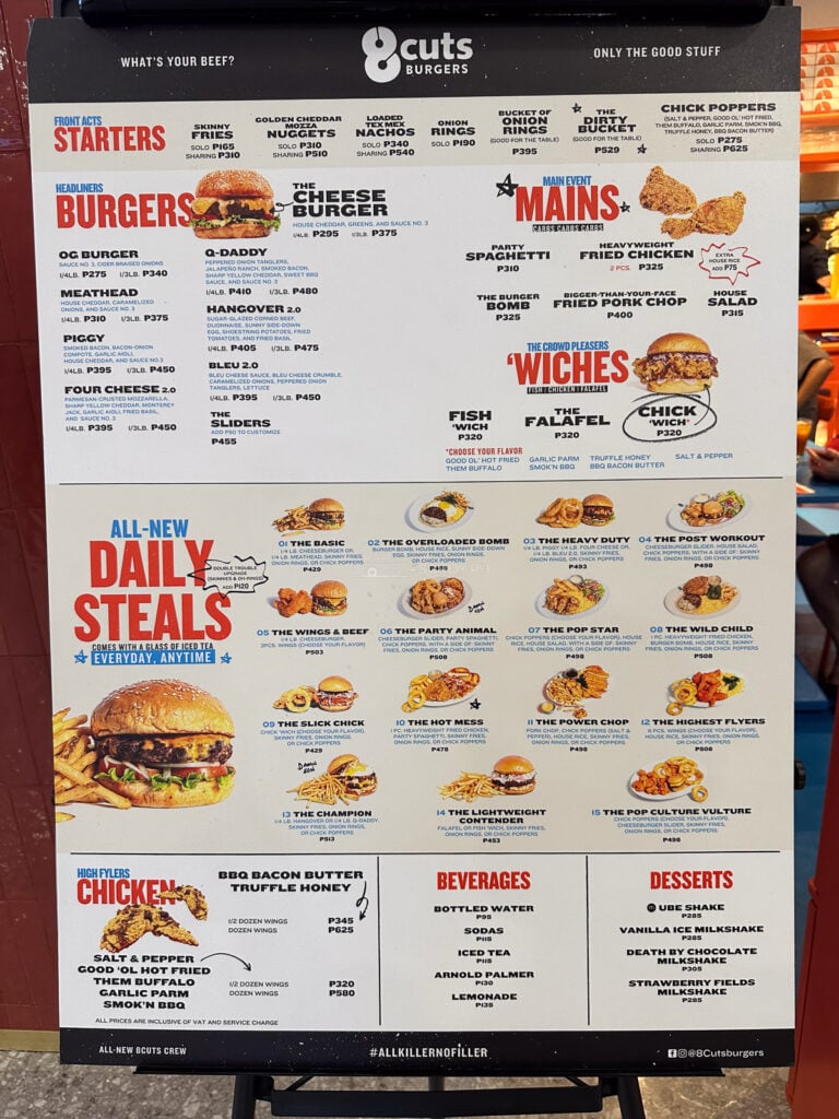 The full 8Cuts menu board at SM City Cebu showing starters, burgers, mains, the fifteen Daily Steals, wings, drinks and desserts with prices
