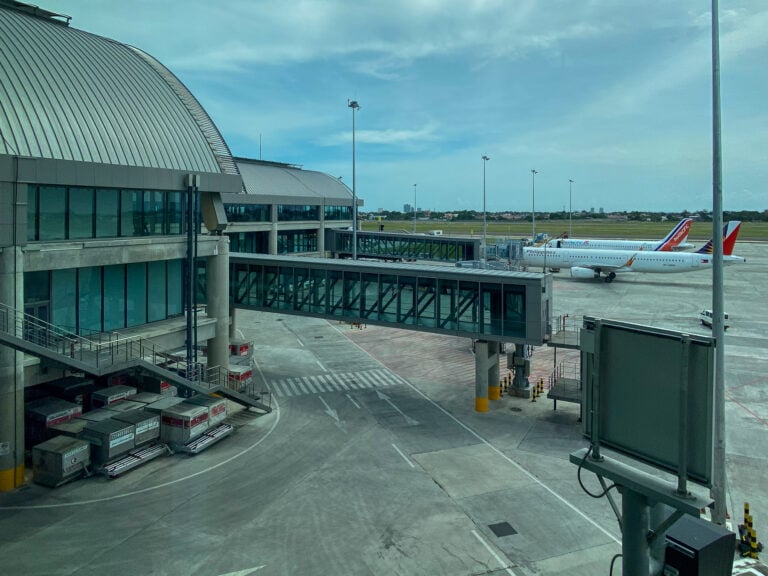 Mactan-Cebu International Airport terminal and aircraft on the apron