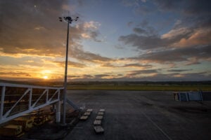 Runway and apron at Iloilo International Airport in Cabatuan at sunset