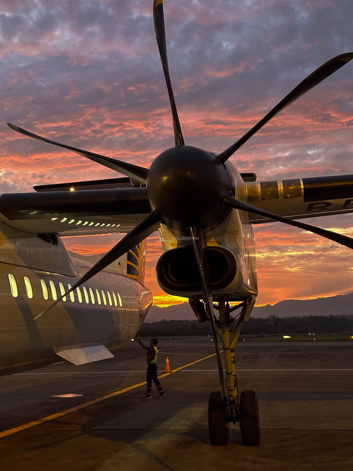 Close view of a turboprop aircraft propeller at sunset at Iloilo Airport