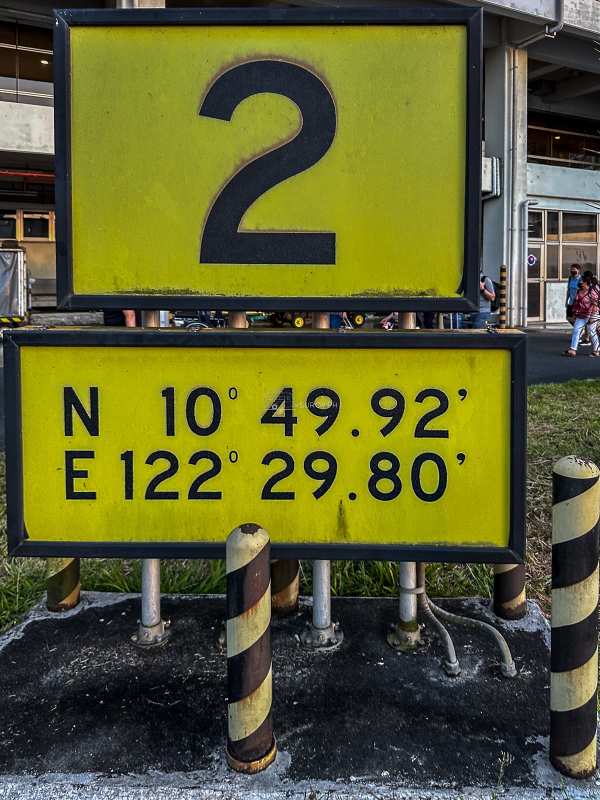 Gate 2 coordinate sign at Iloilo International Airport showing its latitude and longitude