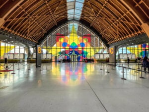 Stained glass and timber arches inside the Terminal 2 departure hall