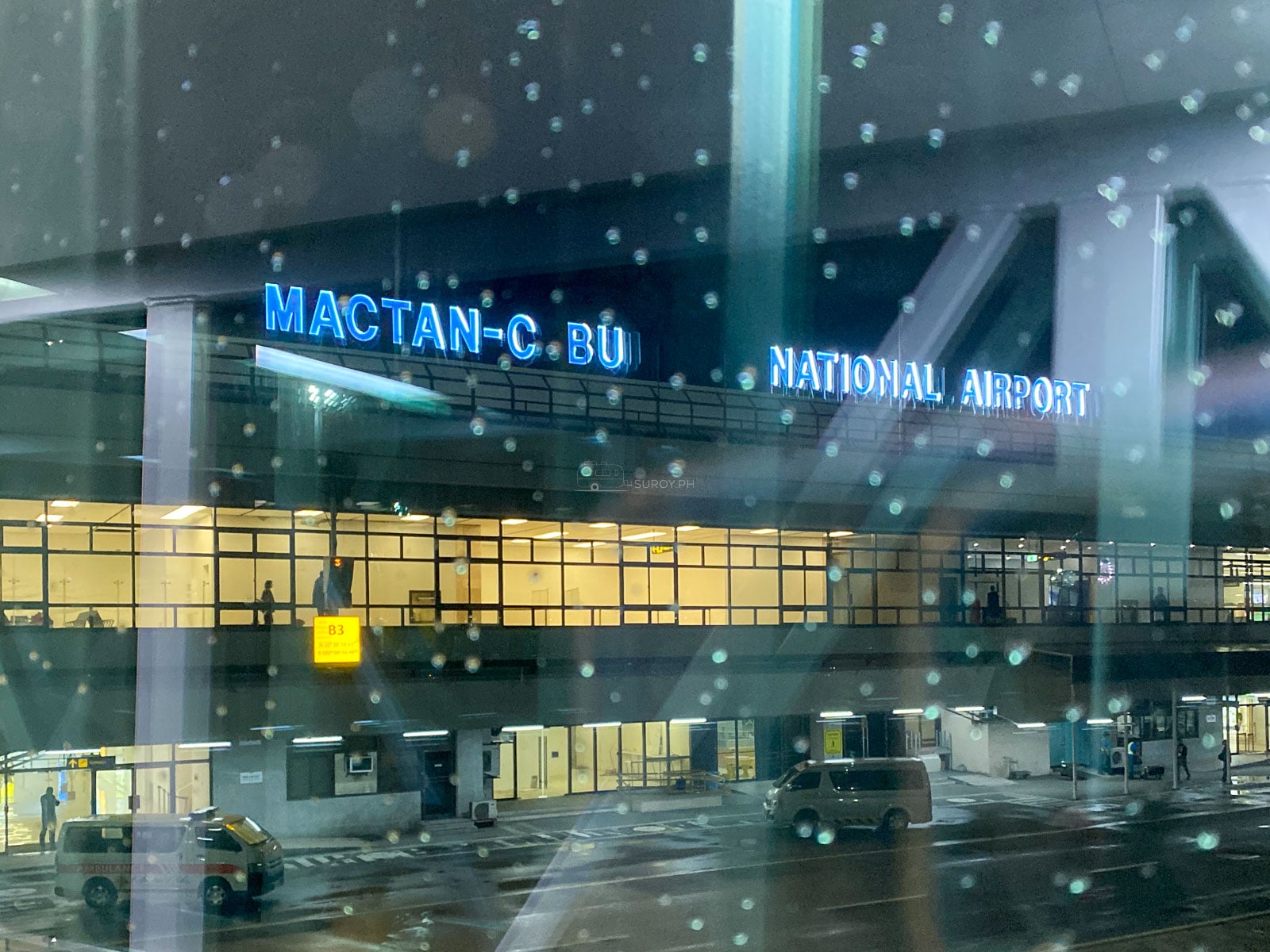 Mactan-Cebu International Airport terminal sign at night